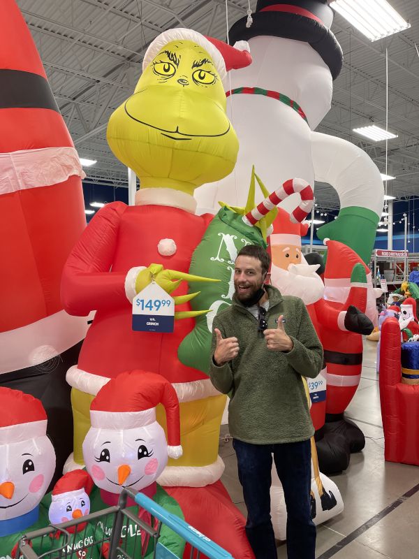 Matt with Blow Ups - He Loves Decorating Our Front Yard for Christmas!